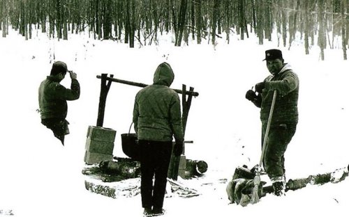 Seneca Indians demonstrating technique used in winter fish drives.