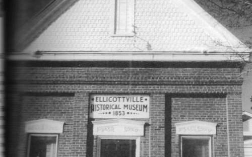Old photo of Old sign on Ellicottville Historical Museum AKA 1853 Building