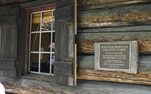National Register of Historic Places plaque on the cabin