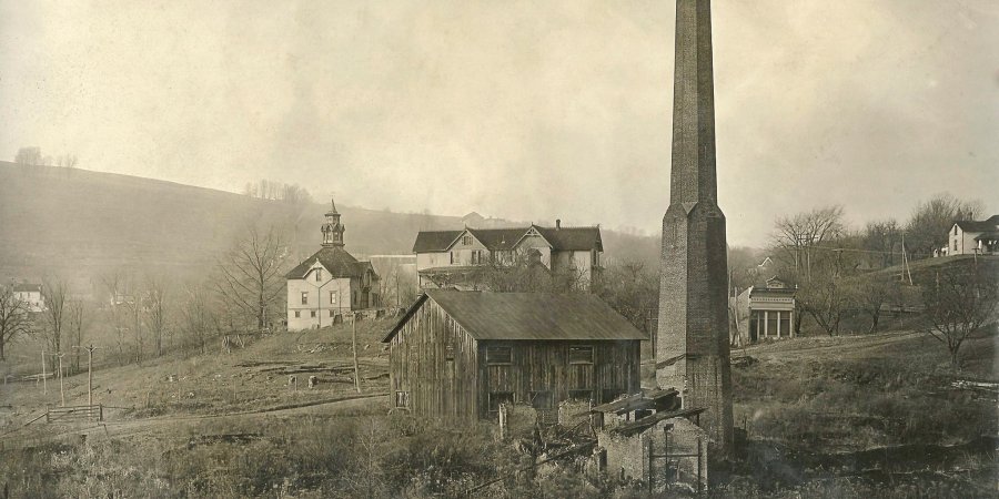 Remains of the tannery and chimney after the fire in 1905
