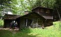 Children touring the chestnut cabin 2024